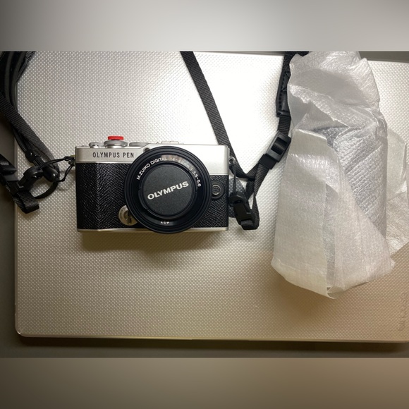 Olympus PEN EP7 Black and Silver Camera with 14-42 mm And 40-150 mm lenses
